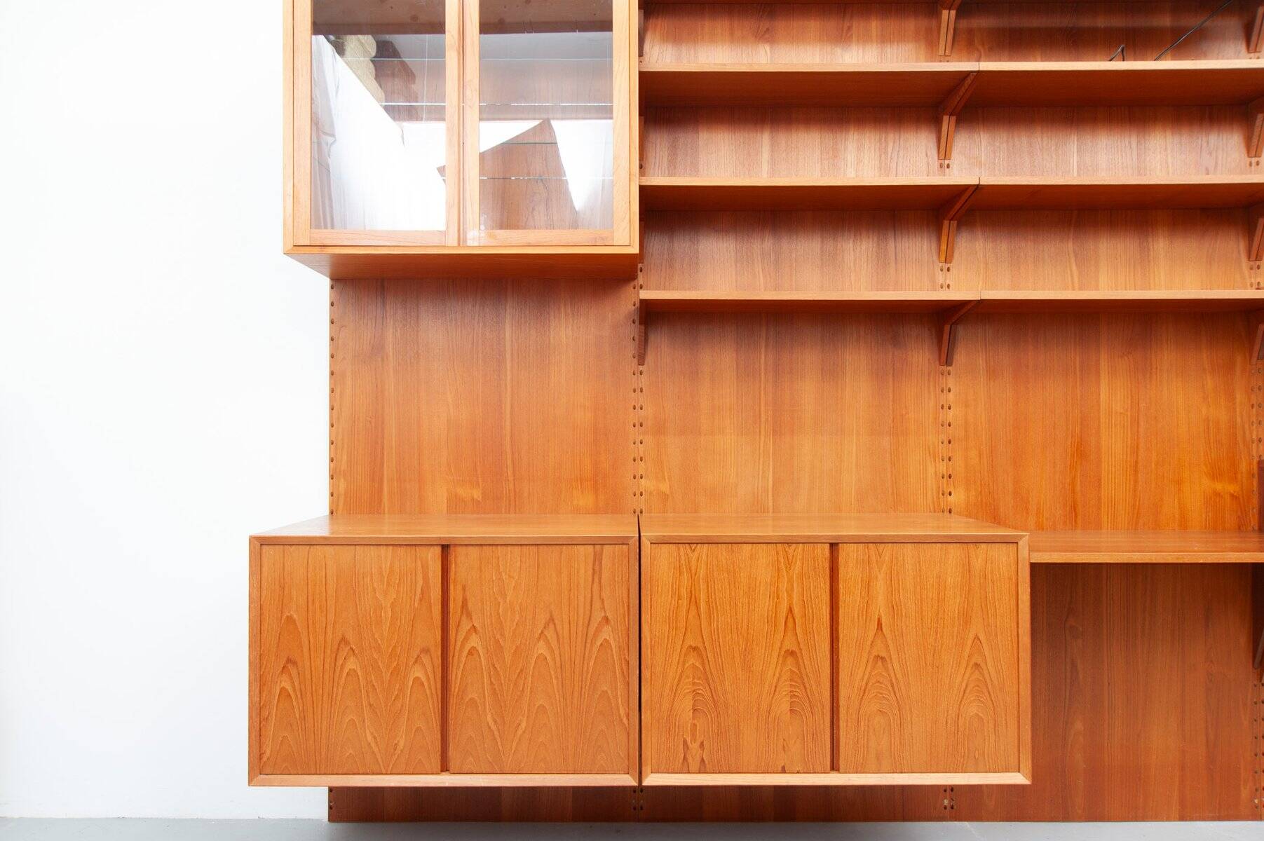 Royal mid-century teak wall unit by Poul Cadovius for Cado, 1960s