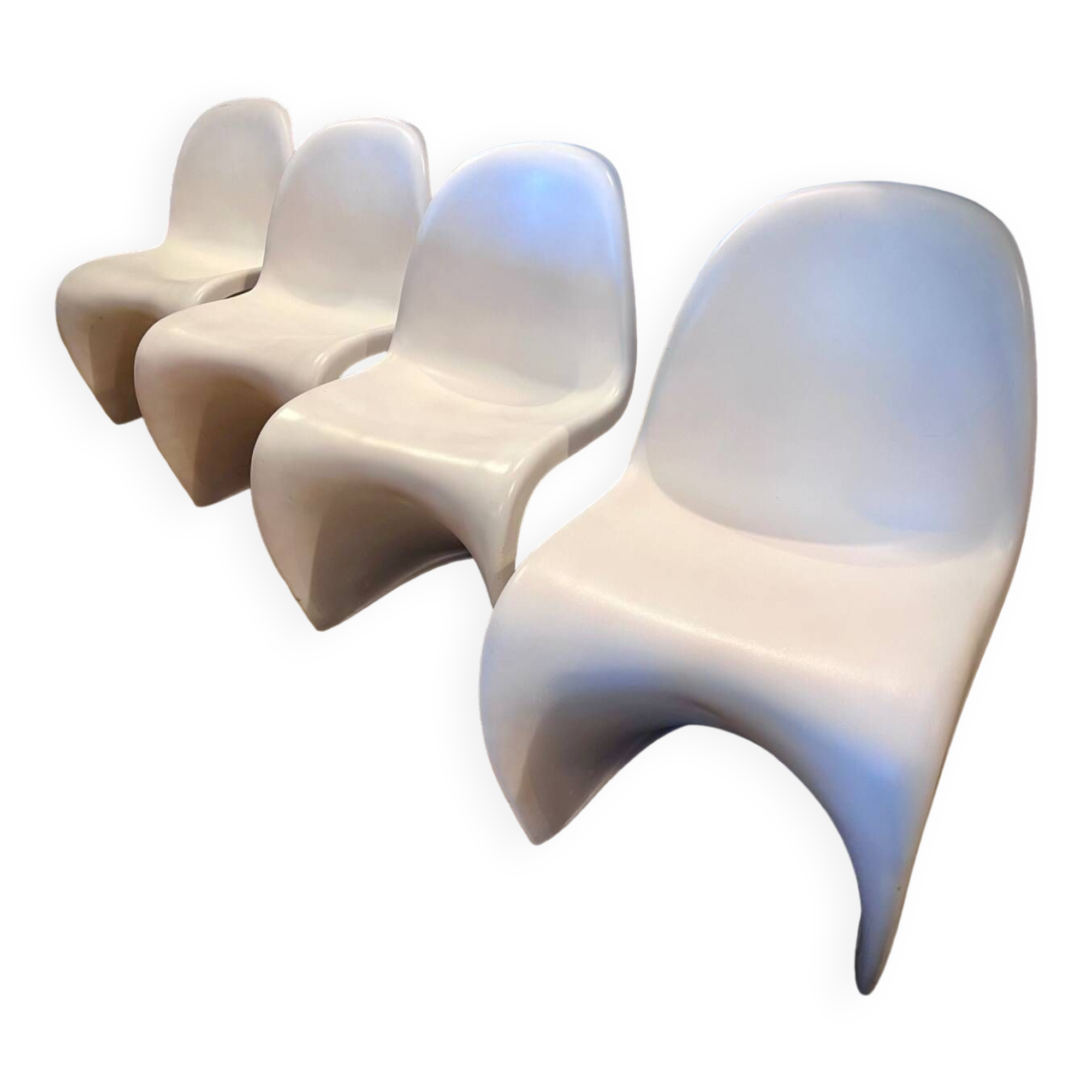 4 white Panton style armchairs