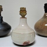 Three vintage ceramic lamps in blue, white and suede