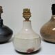 Three vintage ceramic lamps in blue, white and suede