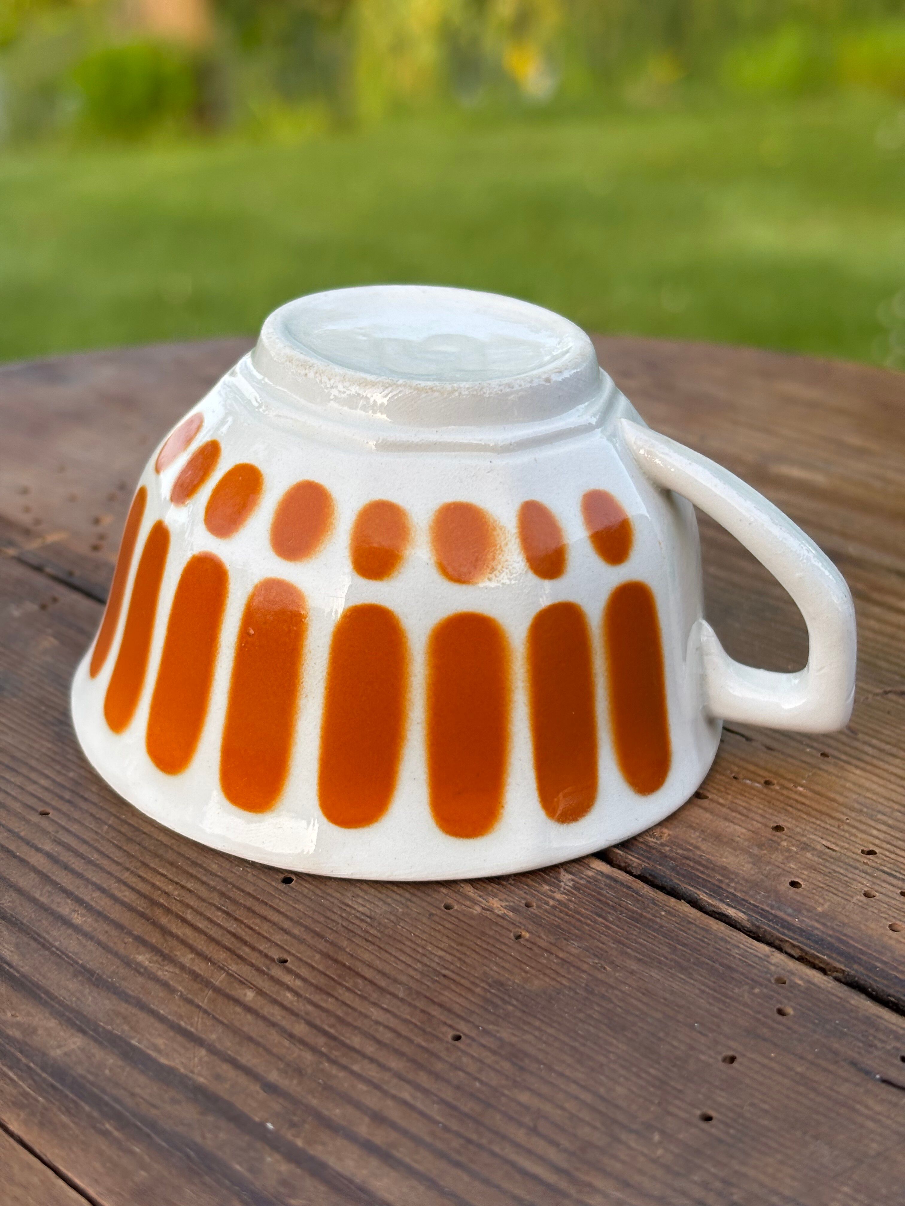 Superb old Sarreguemines Capri orange cup.