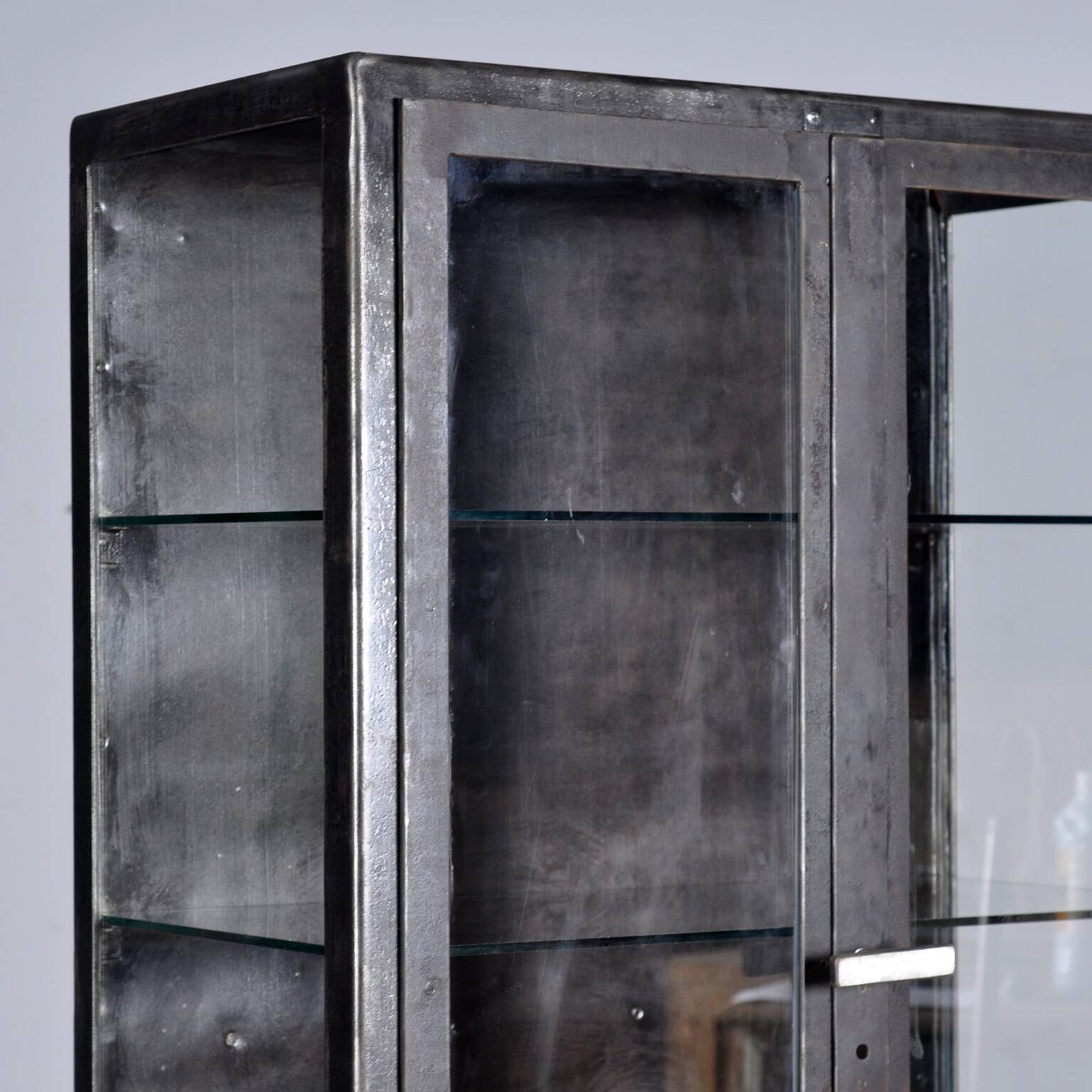 polished iron medical cabinet, 1950’s