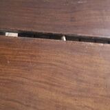 Old table with central leg, small casters, 2 extensions