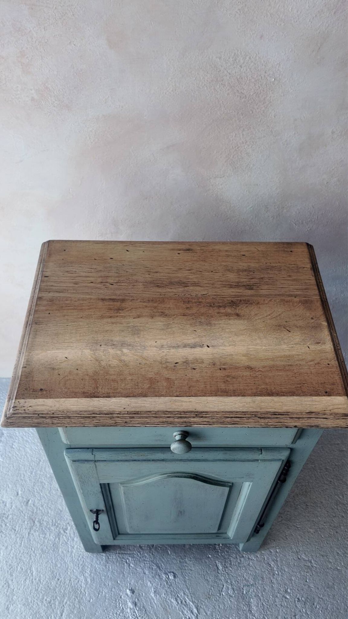 Small vintage side table in sage green patina and solid wood.