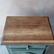 Small vintage side table in sage green patina and solid wood.