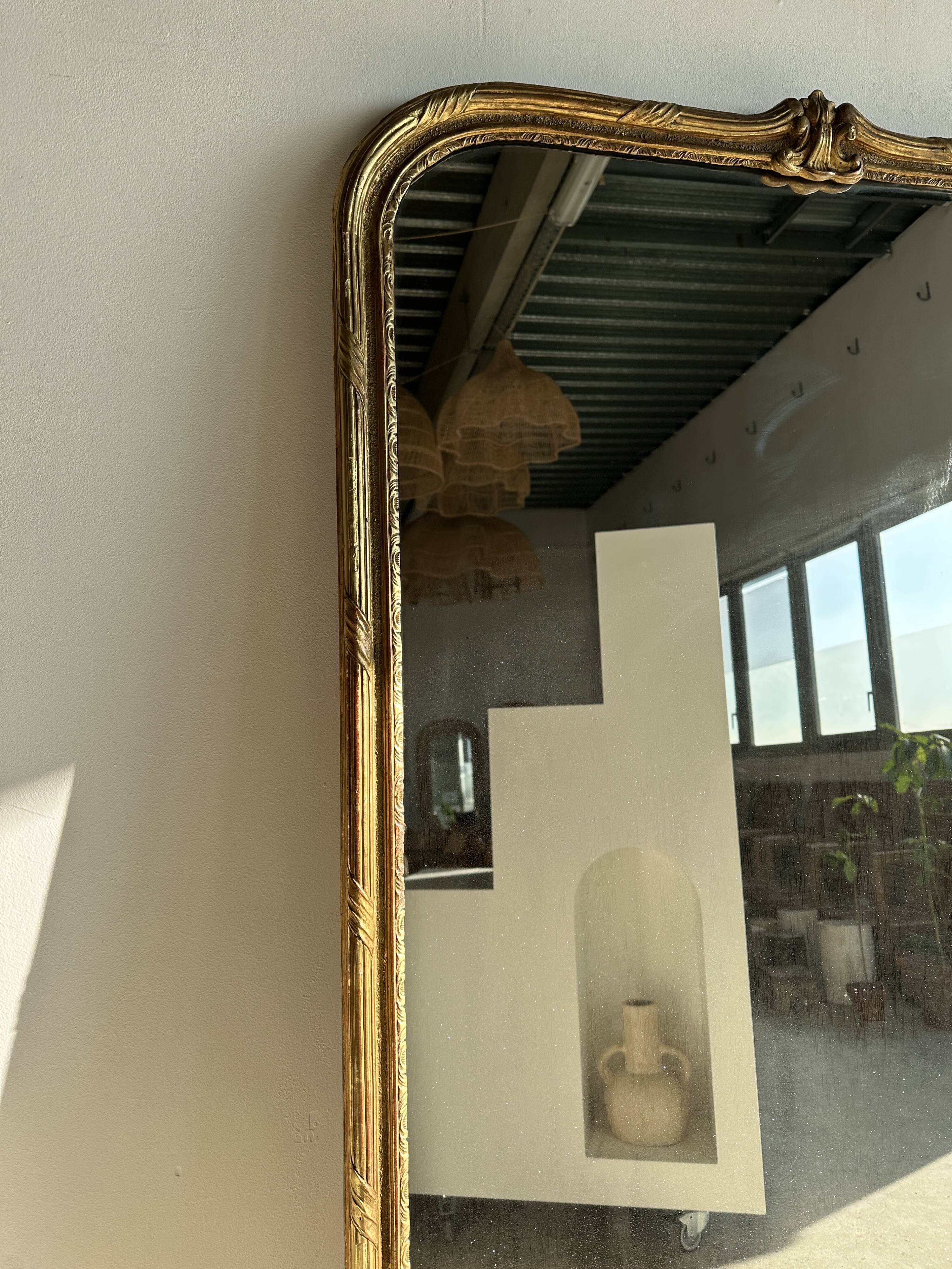 Large gilded mirror 19th century rounded corners mercury glass Louis XVI style