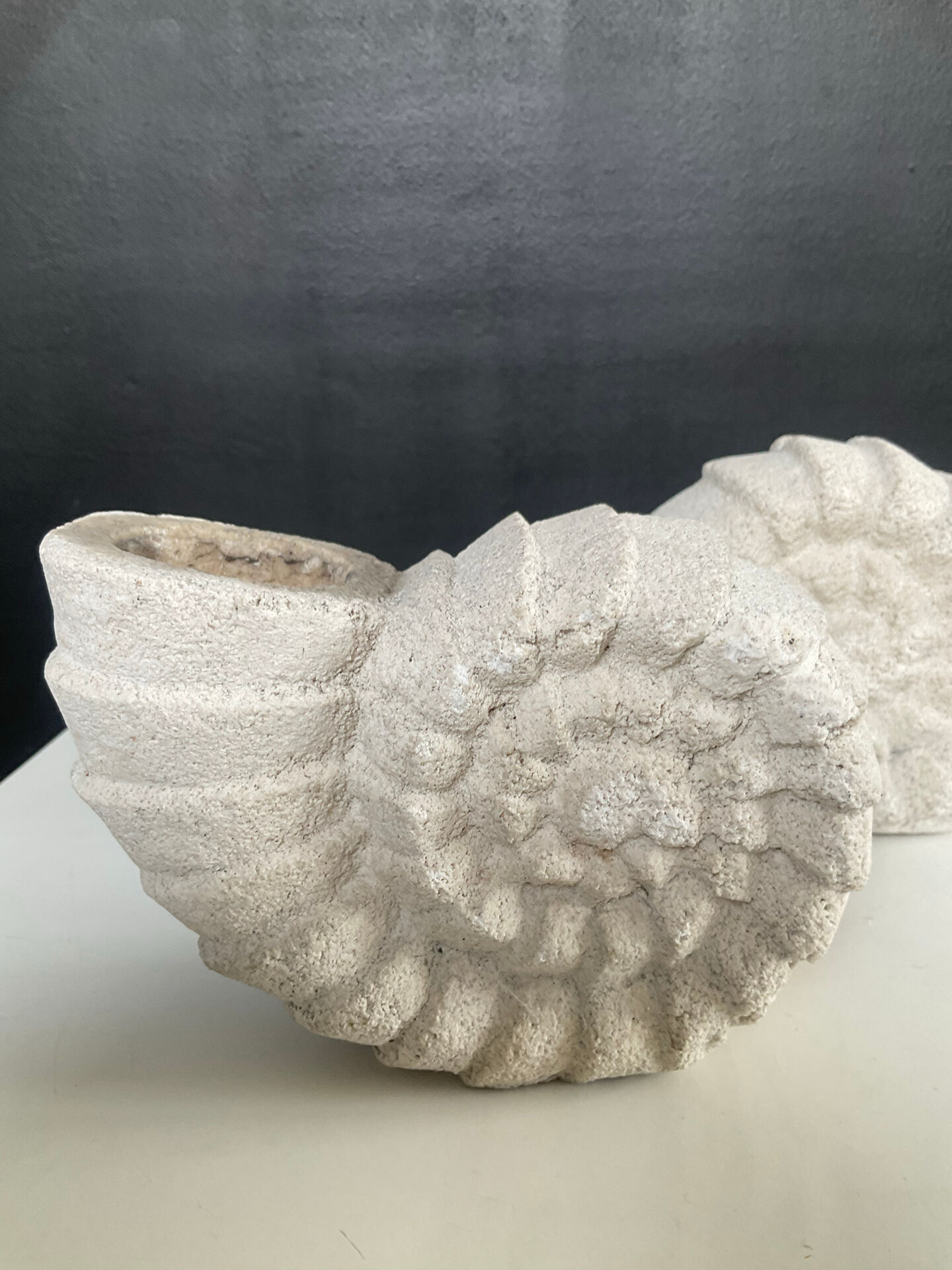 Vintage stone shell candlestick pair