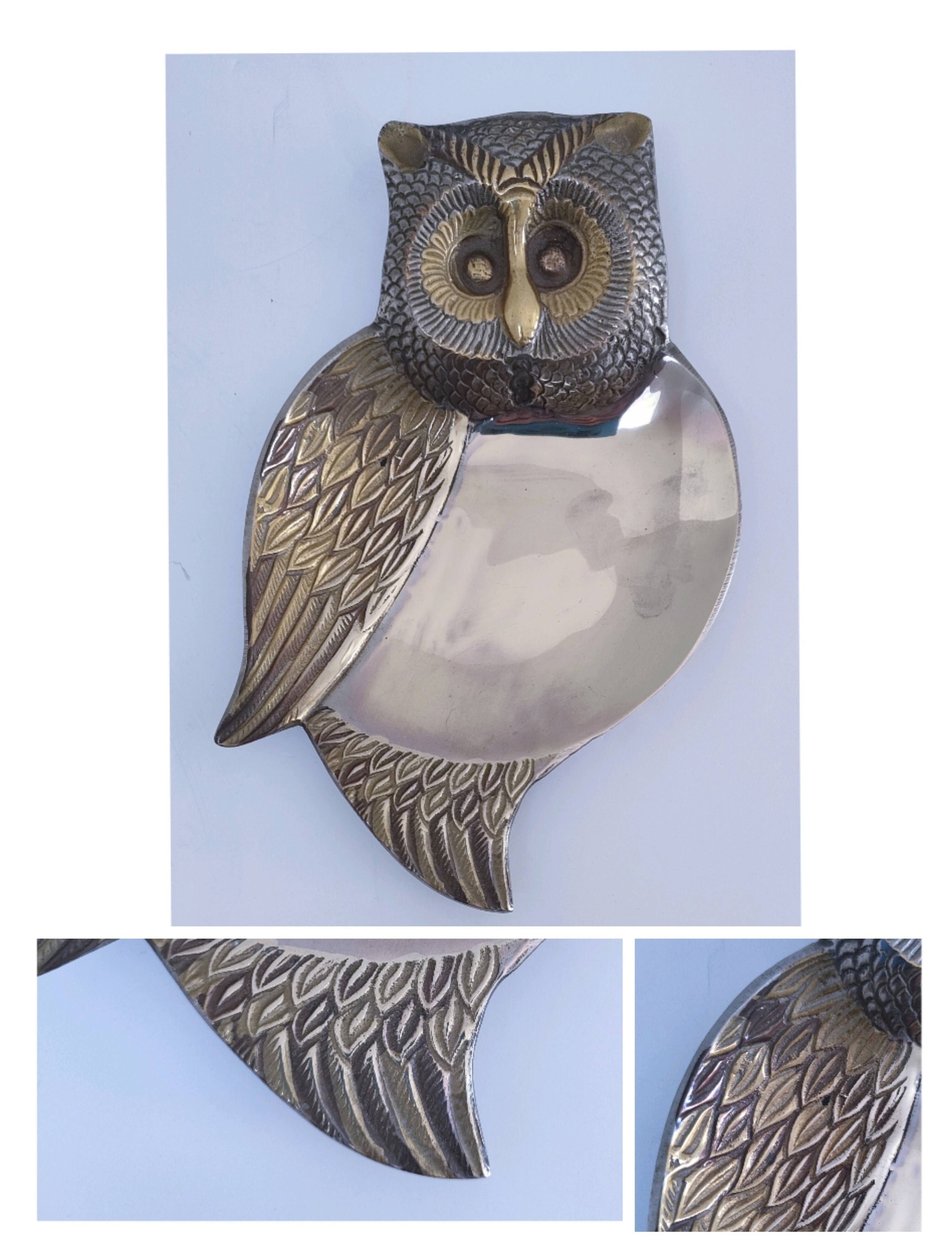 Empty pocket owl in gold and silver metal