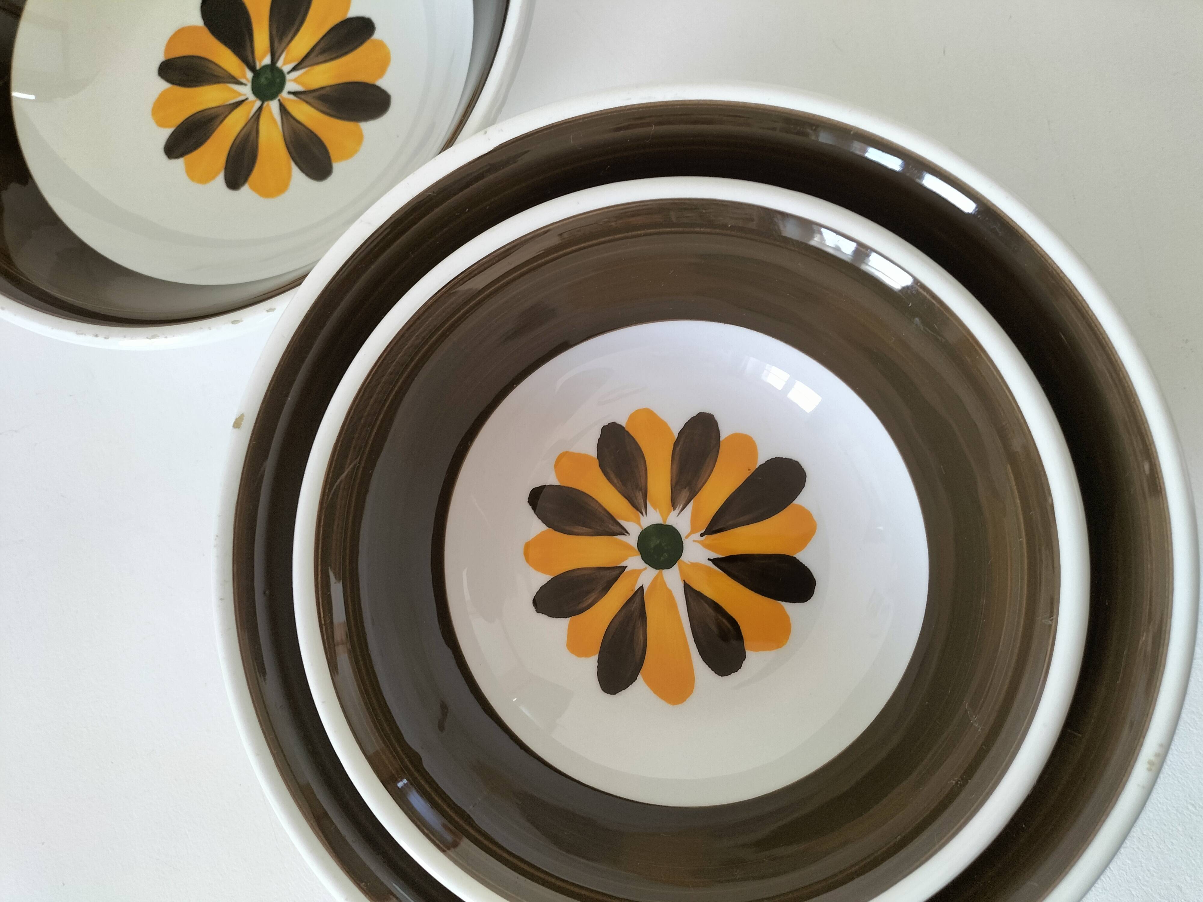 Trio of Italian 1970s deep plates, ochre brown floral decoration