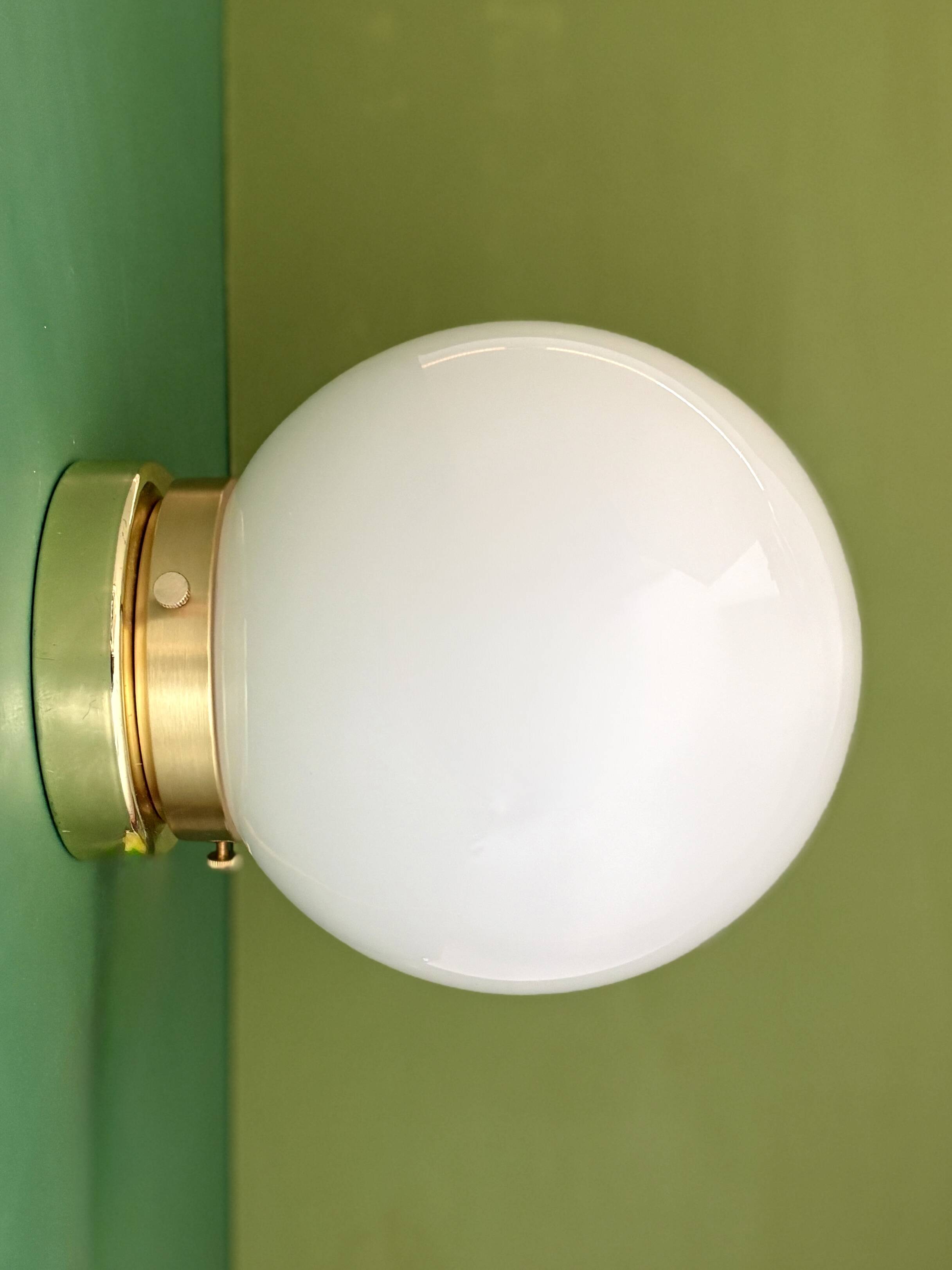 Vintage wall or ceiling light globe in white opaline.