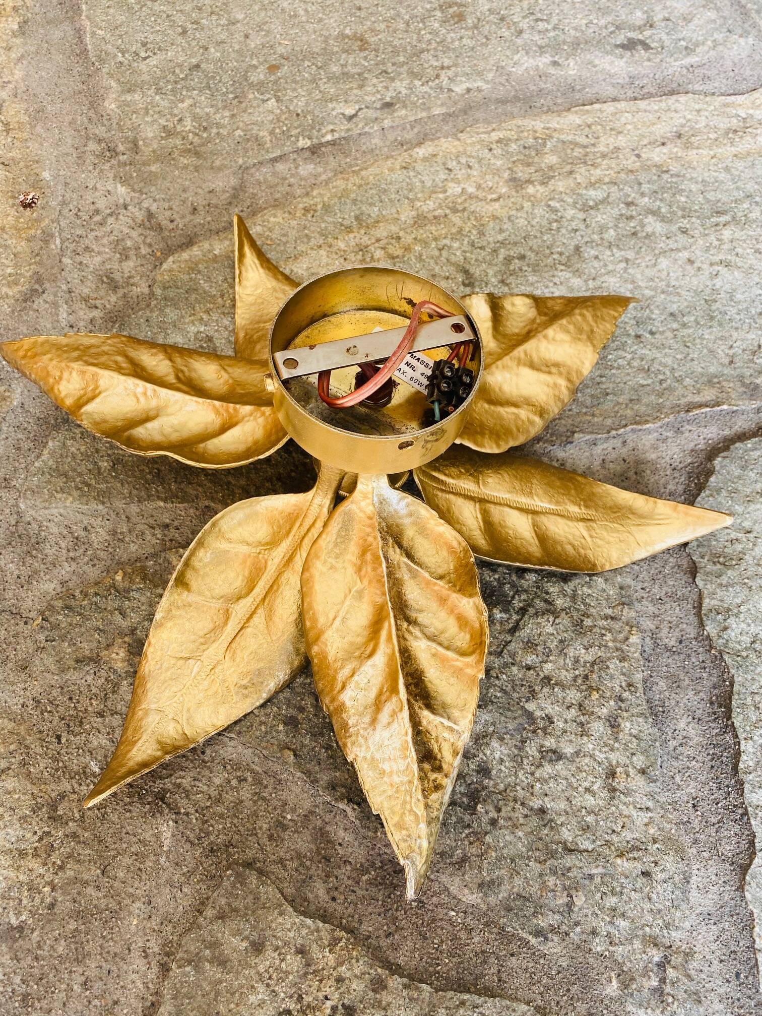 Gold metal flower wall light