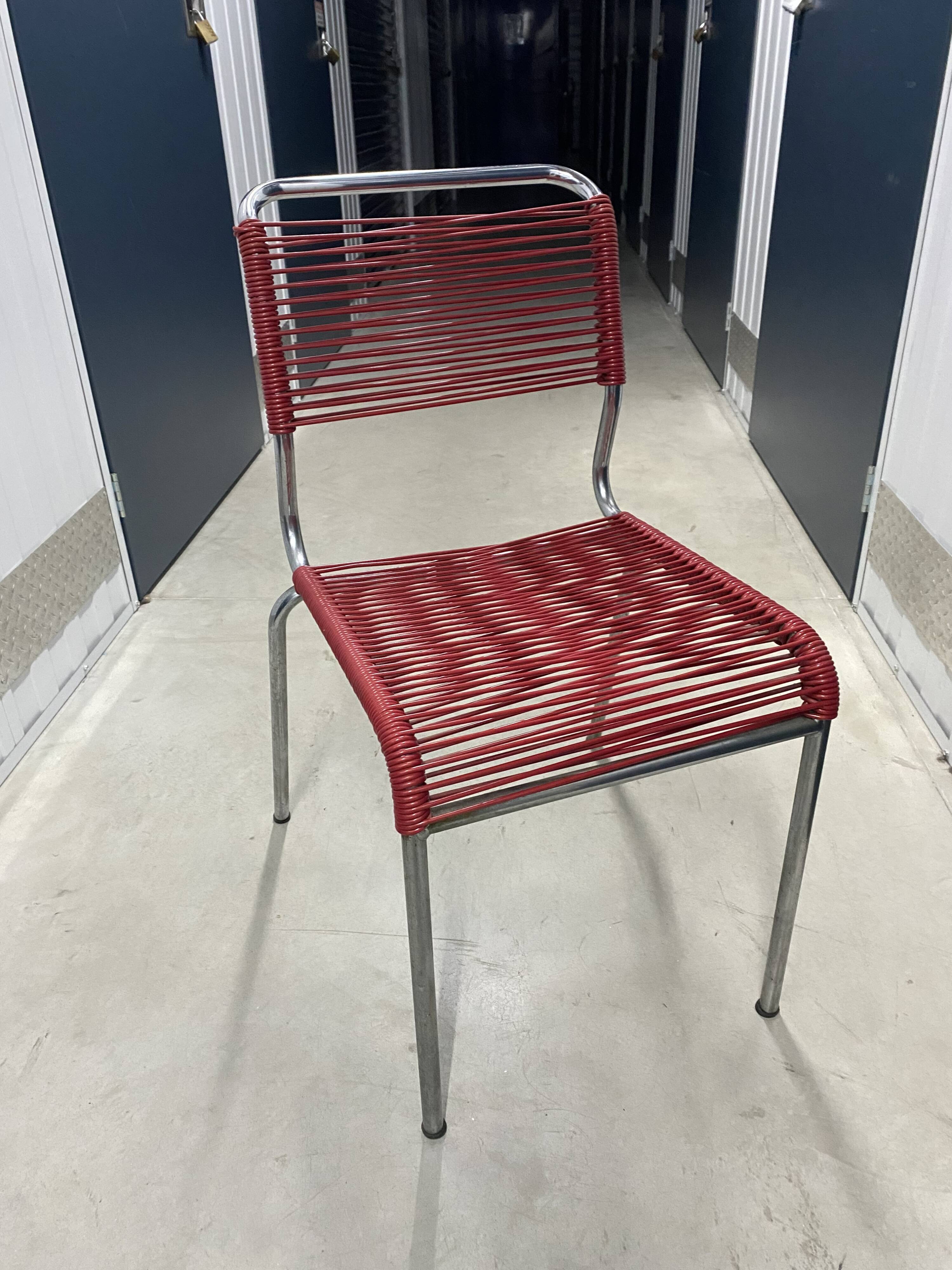 Red scoubidou chair from the 1960s.