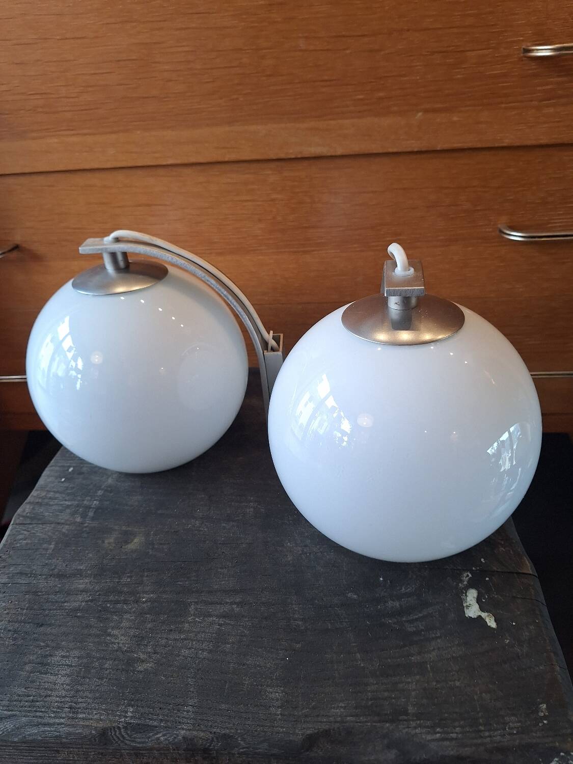 Pair of white ball wall lights