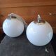 Pair of white ball wall lights