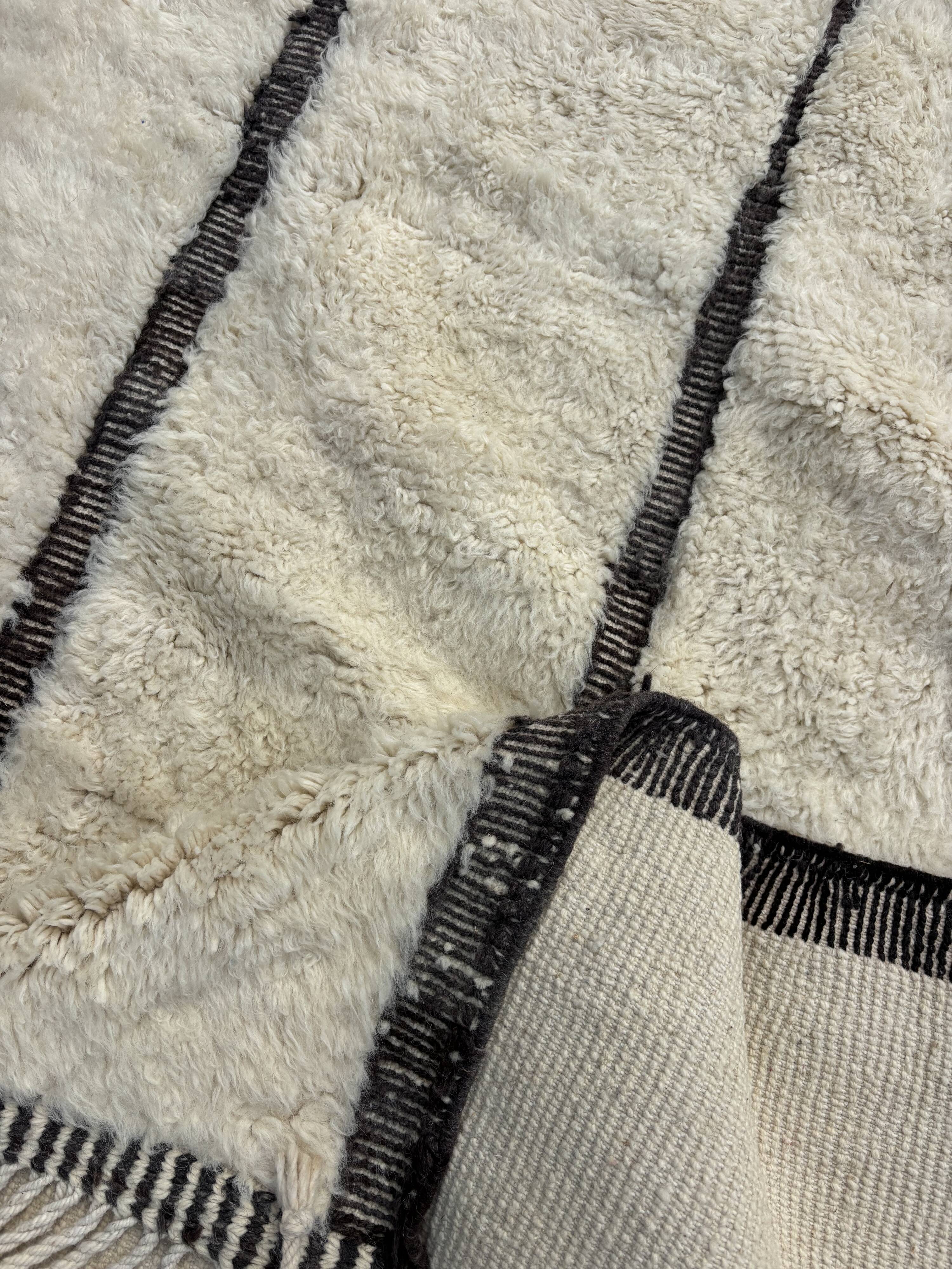Large Berber M'rirt rug in cream and black wool, Moroccan rug.