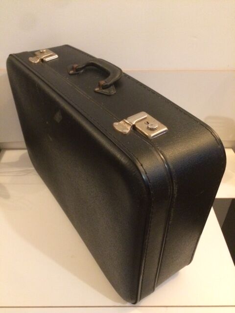Antique vintage black upholstered vintage suitcase