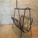 1970s black wrought iron ironing board with enamelled tiles