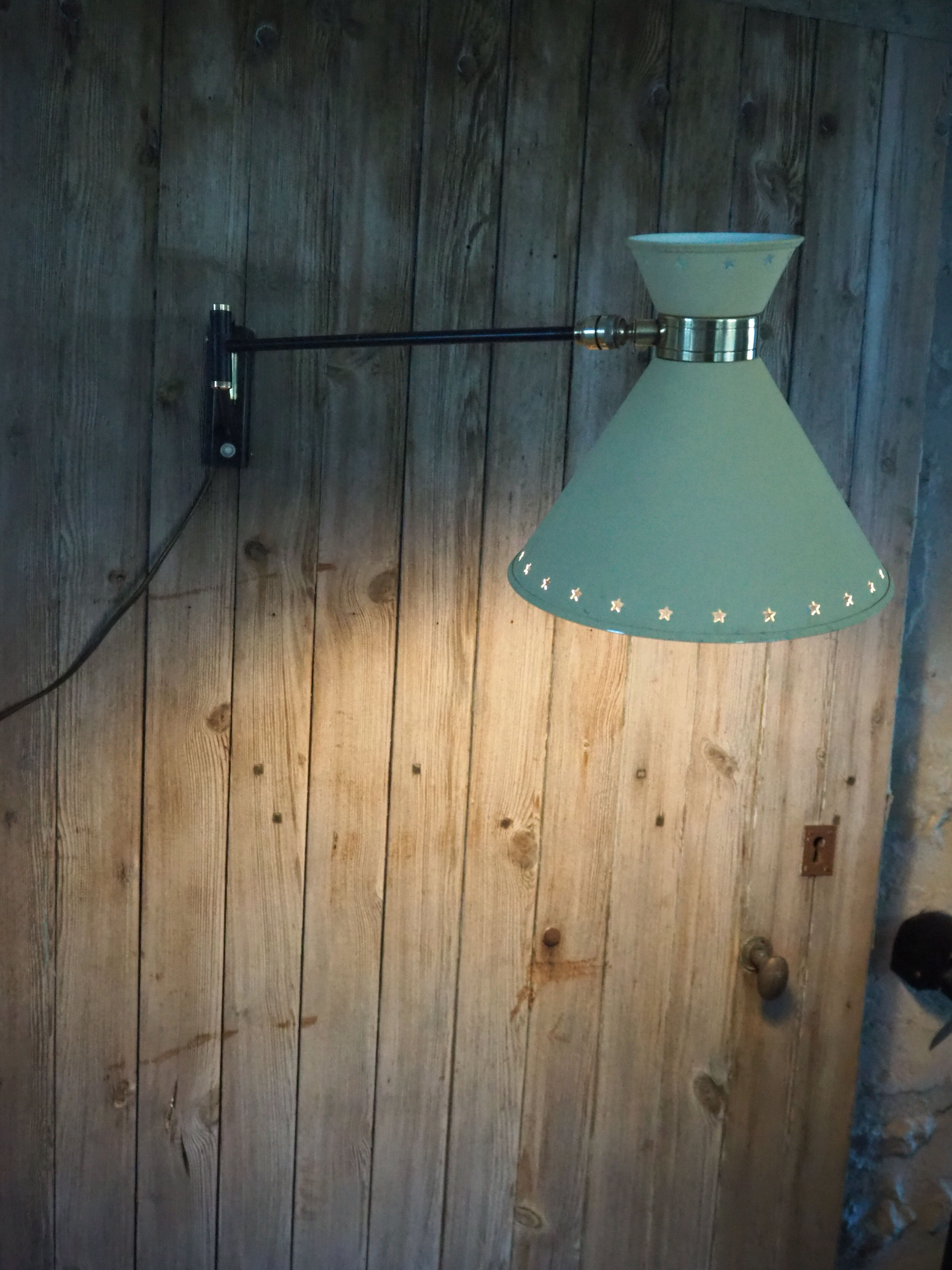 Diabolo articulated wall lamp by designer René Mathieu