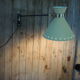 Diabolo articulated wall lamp by designer René Mathieu