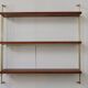 String shelf in teak and gold metal