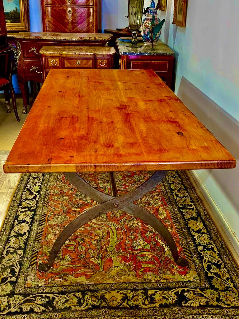 Rectangular wooden table, legs and spacer in hammered ironwork, 60s
