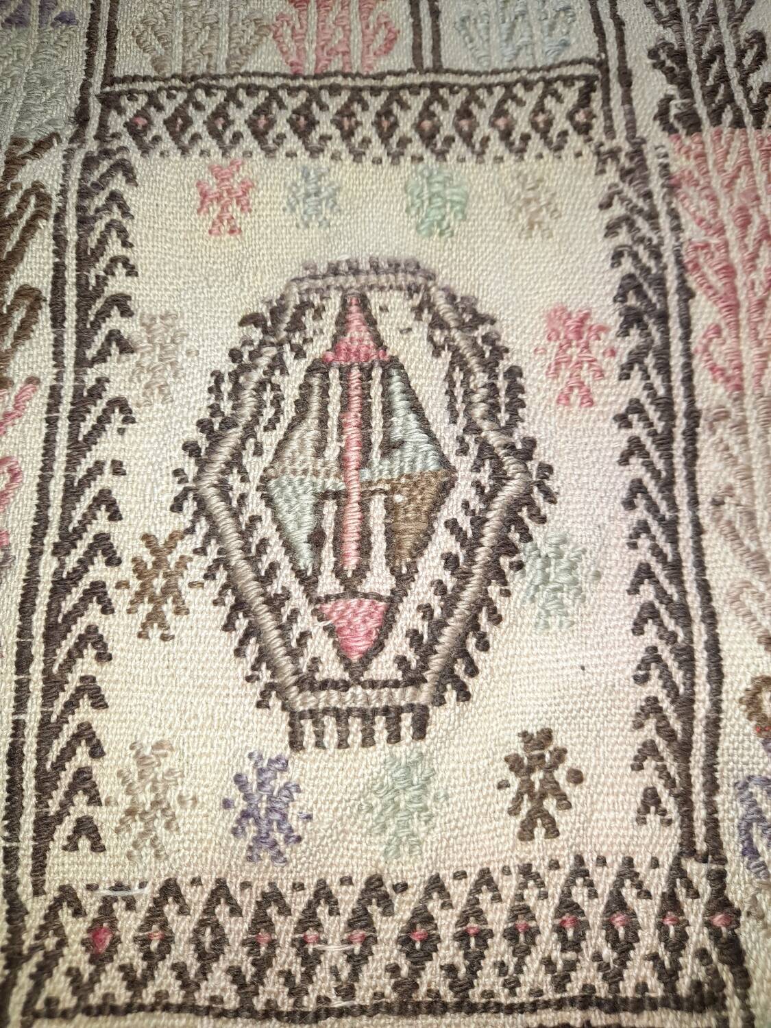 Antique embroidered kilim with 16 medallions from Turkey or the Balkans, c. 1950.