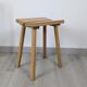 Nordic design wooden stool model ypperlig by ikea with a minimalist seat.
