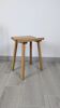 Nordic design wooden stool model ypperlig by ikea with a minimalist seat.