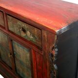 Antique Chinese sideboard in red lacquered wood with carved details and paintings