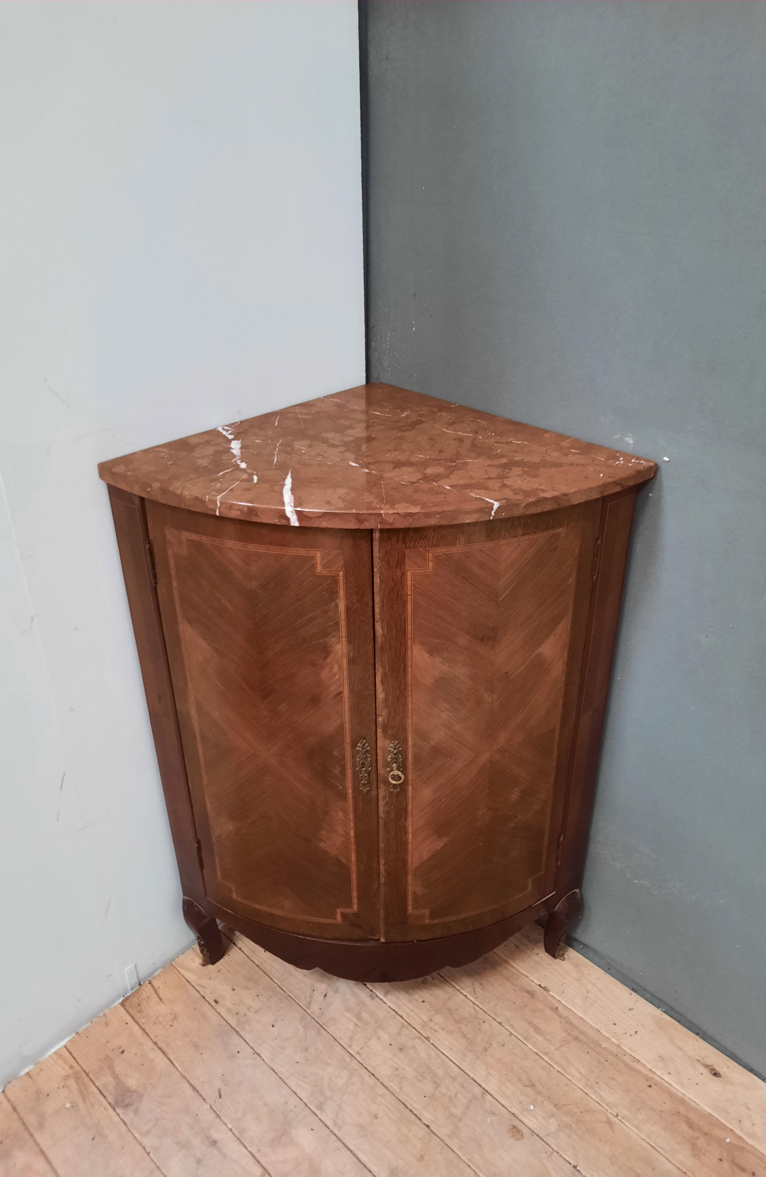 Corner cabinet with marble top