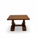 A small, rustic walnut wooden table, crafted from solid walnut wood, 1