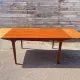 Rectangular extendable table in Scandinavian style made of teak.