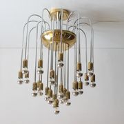 Tubular chrome and brass waterfall chandelier, Italy 1970s.
