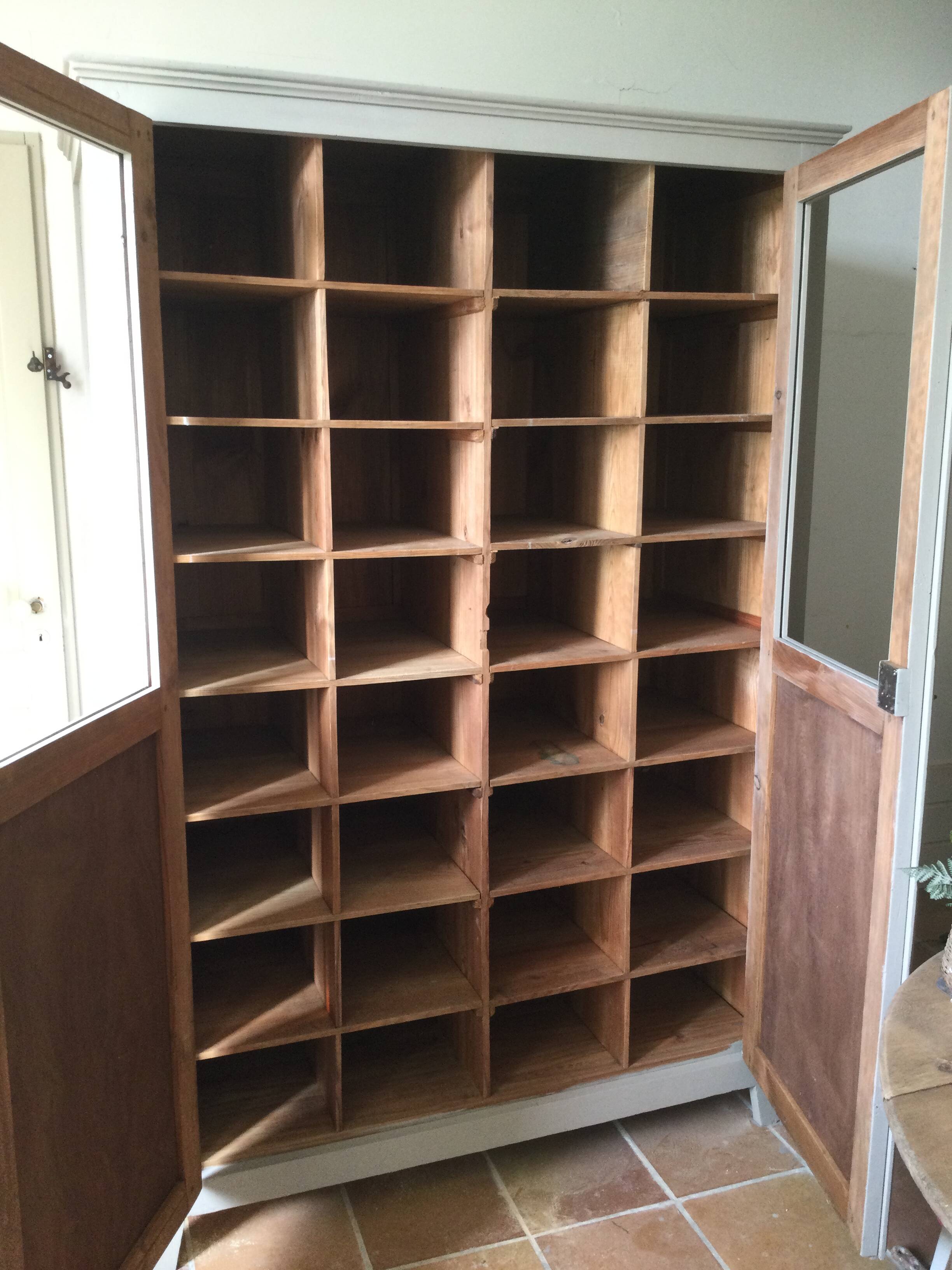 Antique Parisian wardrobe with interior compartments.