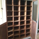 Antique Parisian wardrobe with interior compartments.