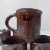coffee service in iridescent stoneware cups and vintage sugar bowl