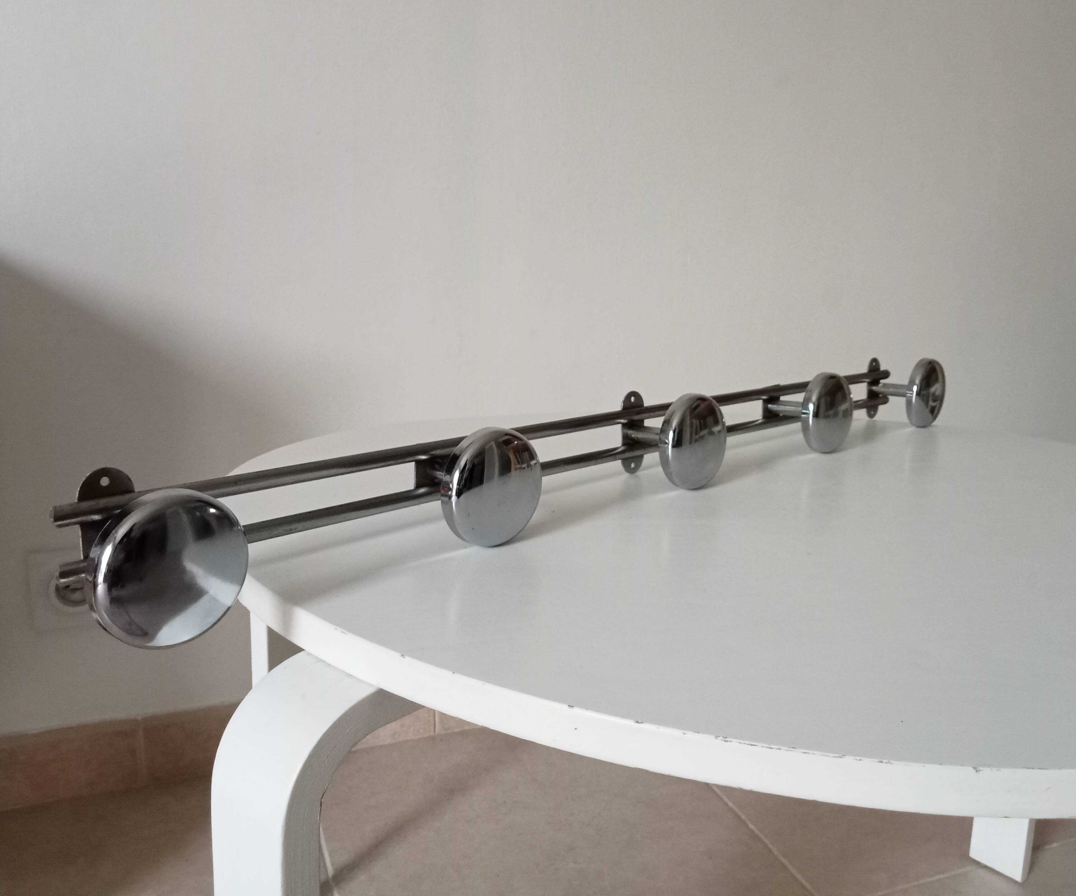 Vintage chrome wall-mounted coat rack from the 1970s