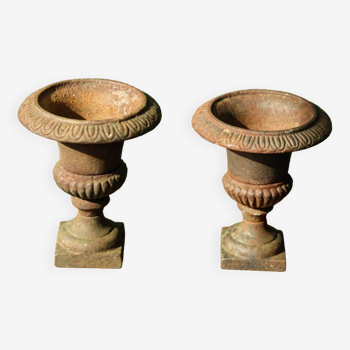 Pair of miniature cast iron Medici vases