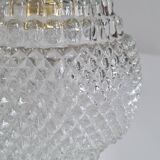 Pair of chiseled glass sconces