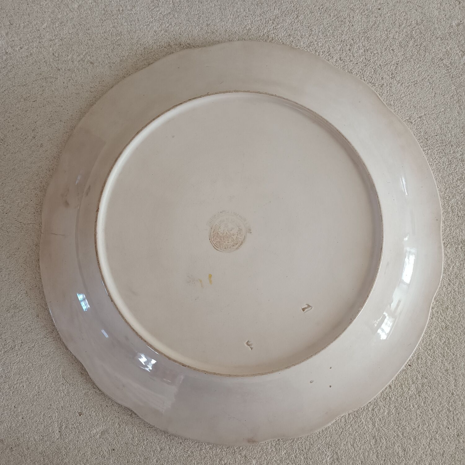 Set of five Longwy iron earth plates