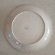 Lot de cinq assiettes terre de fer Longwy