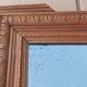 Louis XVI mirror in carved wood, 19th century.
