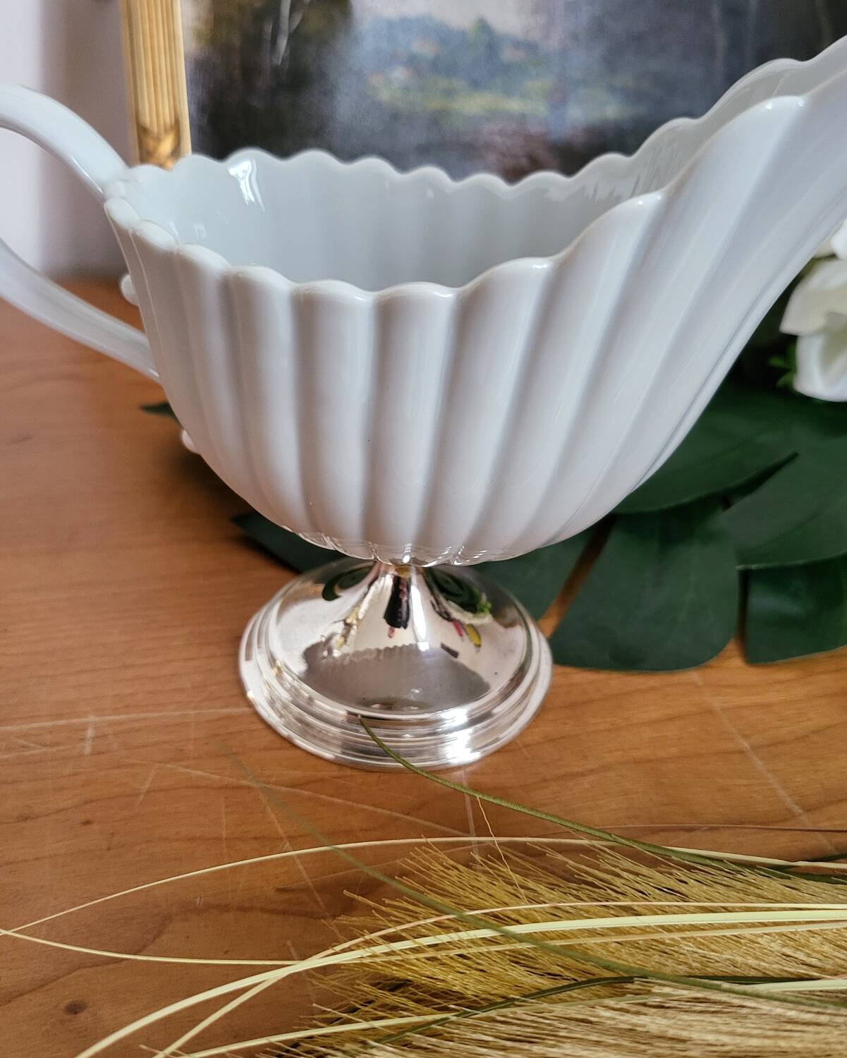 Porcelain and silver-plated gravy boat