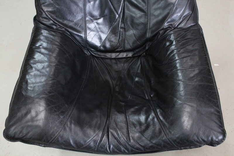Leather and beech relaxation chair - 1970 / 1980