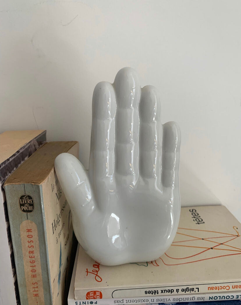 Vintage bookends in the shape of ceramic hands