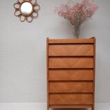 High wooden chest of drawers in the 50s