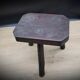 Dark octagon tripod stool