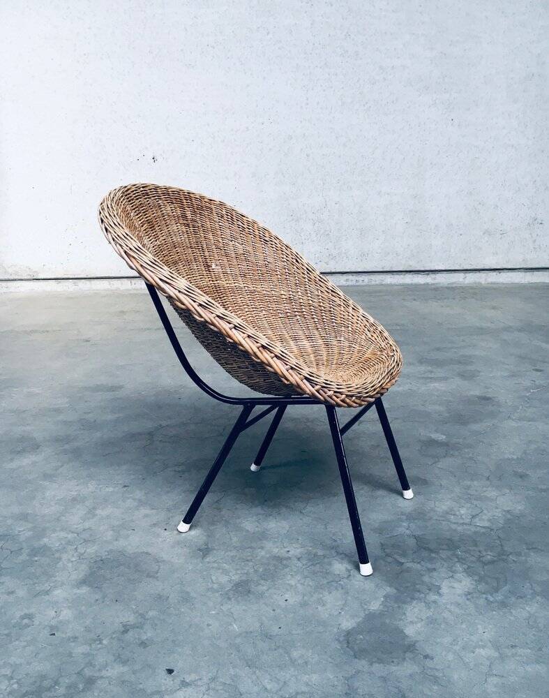 Wicker lounge chair in the style of Dirk Van Sliedregt for Rohé Noordwolde, Netherlands, 1960s.