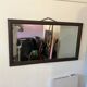 Large vintage mirror with a carved solid wood frame.
