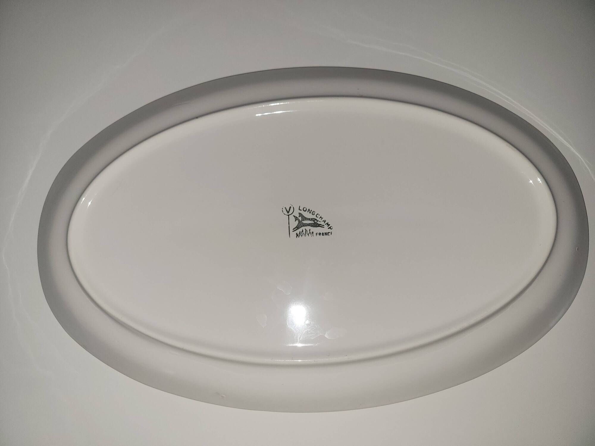 Longchamp oval plate